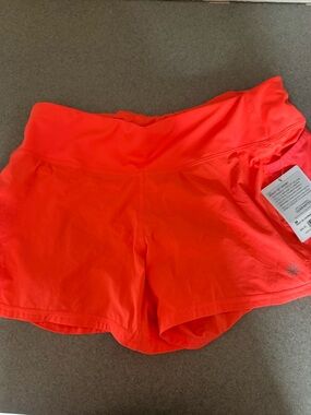 Athleta Bright Coral Athletic Shorts nwt size medium